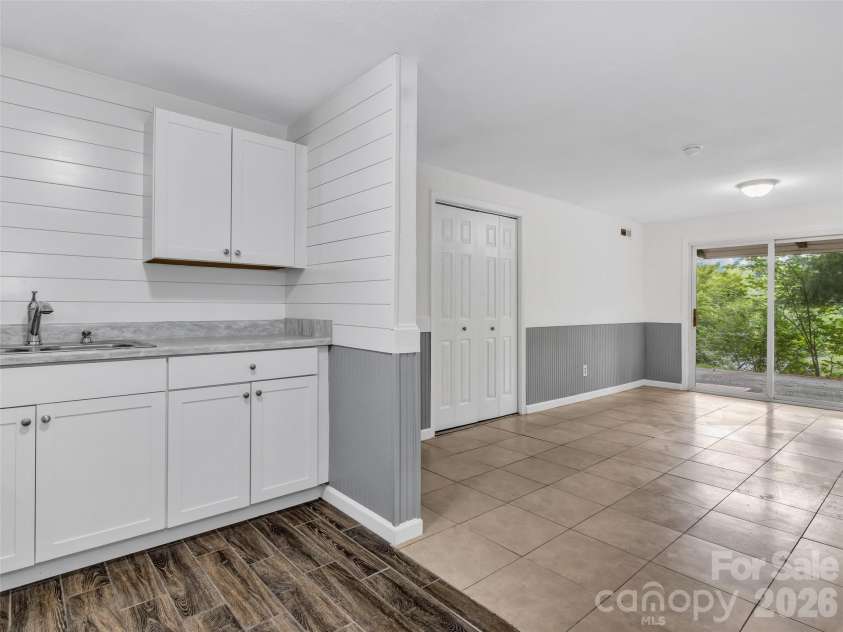 114 Elden Street, Hendersonville, NC 28791.  MLS# CAR4355283, YatesRealty ID 9627. Lower unit