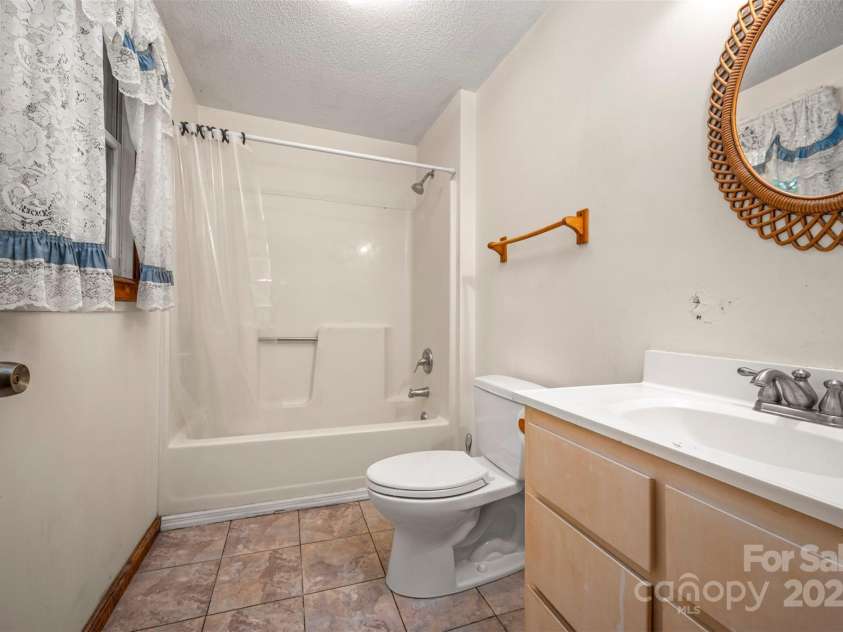 102 Windwood Hill Road, Hendersonville, NC 28739.  MLS# CAR4305919, YatesRealty ID 963. 