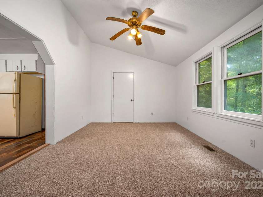 102 Windwood Hill Road, Hendersonville, NC 28739.  MLS# CAR4305919, YatesRealty ID 963. Basement access door