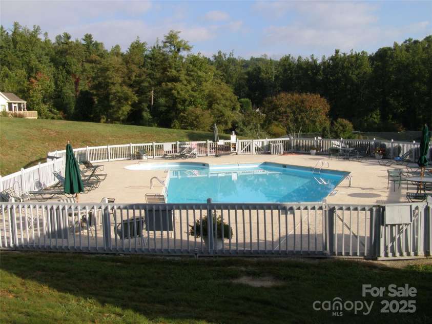 103 GOLFSIDE Drive, Flat Rock, NC 28731.  MLS# CAR4271891, YatesRealty ID 963. 