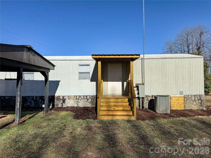 7555 Palm Tree Drive, Vale, NC 28168.  MLS# CAR4349409, YatesRealty ID 9630. 