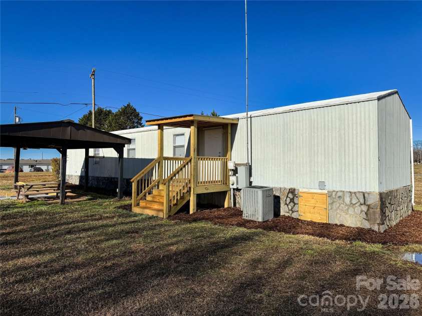 7555 Palm Tree Drive, Vale, NC 28168.  MLS# CAR4349409, YatesRealty ID 9630. 