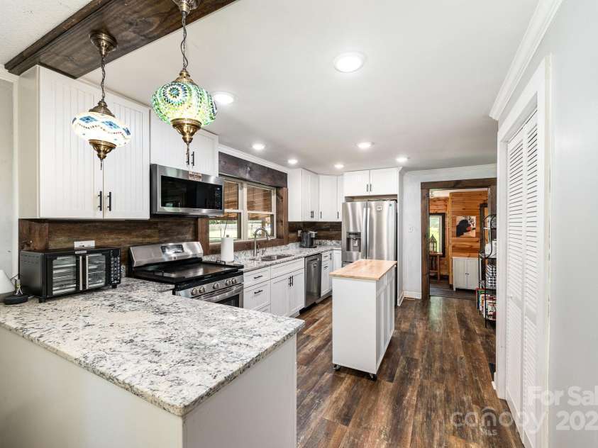 835 Holshouser Road, Rockwell, NC 28138.  MLS# CAR4272934, YatesRealty ID 9631. Main house kitchen
