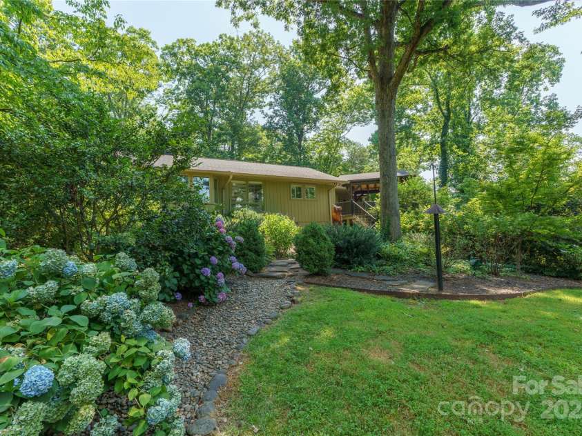 100 Stone Circle Drive, Tryon, NC 28782.  MLS# CAR4220474, YatesRealty ID 9633. 