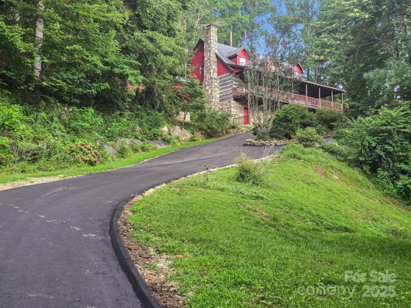 1145 Bearwallow Mountain Road, Hendersonville, NC 28792.  MLS# CAR4287920, YatesRealty ID 9636. 