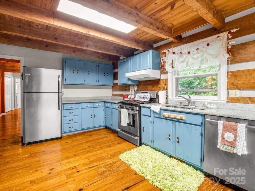 1145 Bearwallow Mountain Road, Hendersonville, NC 28792.  MLS# CAR4287920, YatesRealty ID 9636. 