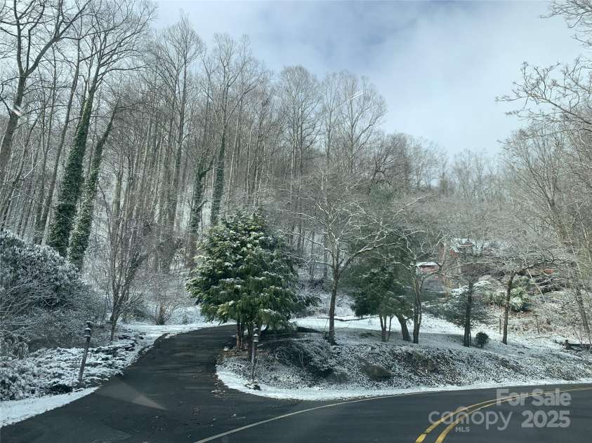 1145 Bearwallow Mountain Road, Hendersonville, NC 28792.  MLS# CAR4287920, YatesRealty ID 9636. 