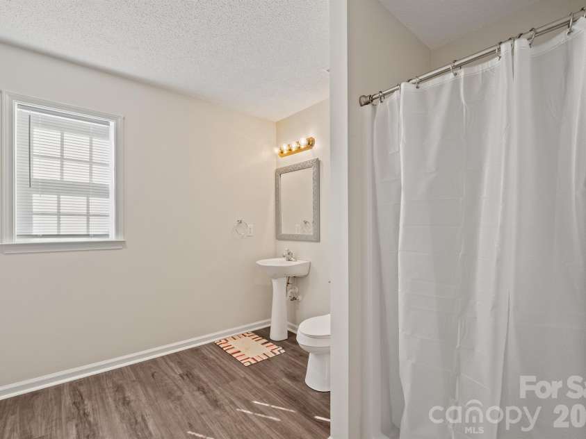 3673 Farm Lake Drive, Concord, NC 28027.  MLS# CAR4312782, YatesRealty ID 9637. Lower level bathroom