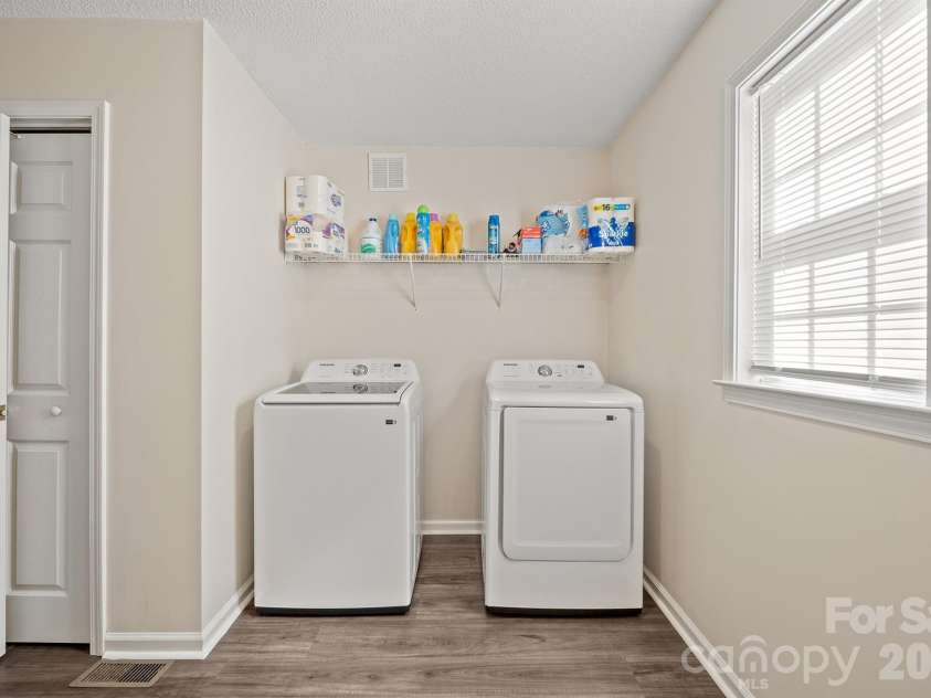 3673 Farm Lake Drive, Concord, NC 28027.  MLS# CAR4312782, YatesRealty ID 9637. Lower level laundry