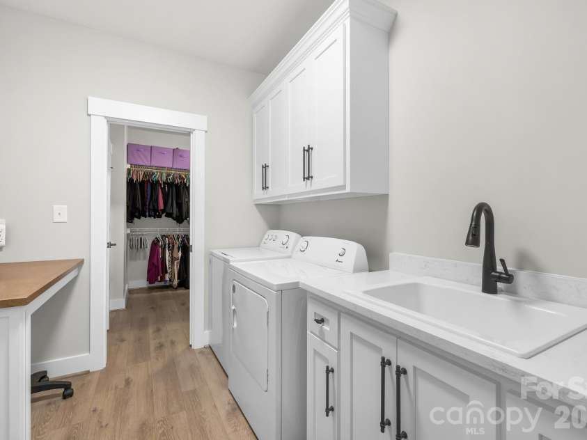 2983 Tavistock Lane, Lincolnton, NC 28092.  MLS# CAR4353084, YatesRealty ID 9644. Laundry room with sink and folding table