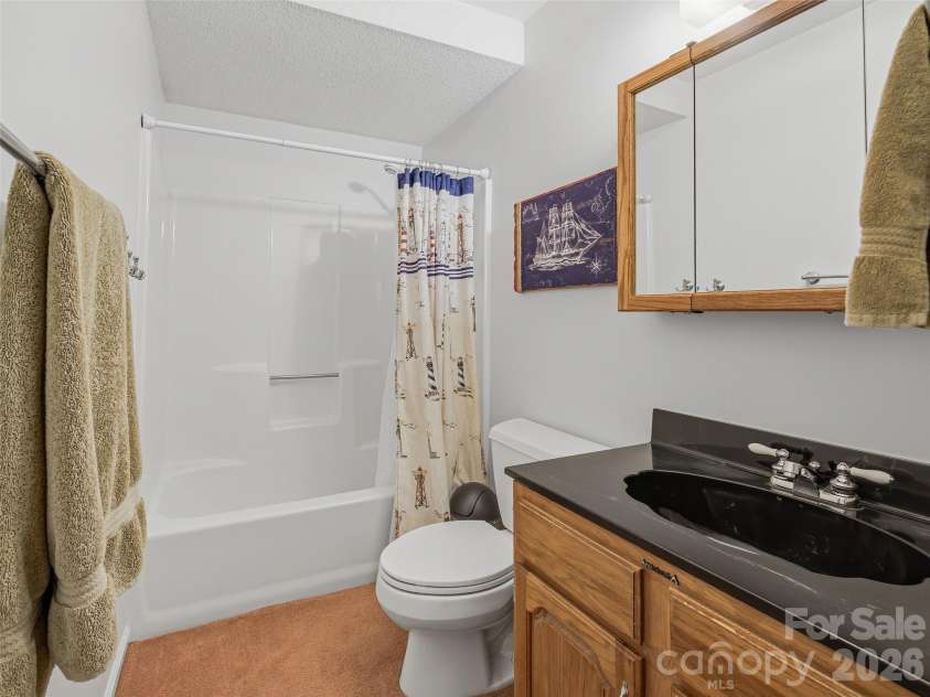 107 Edgewood Court, Arden, NC 28704.  MLS# CAR4365051, YatesRealty ID 9645. Guest bath