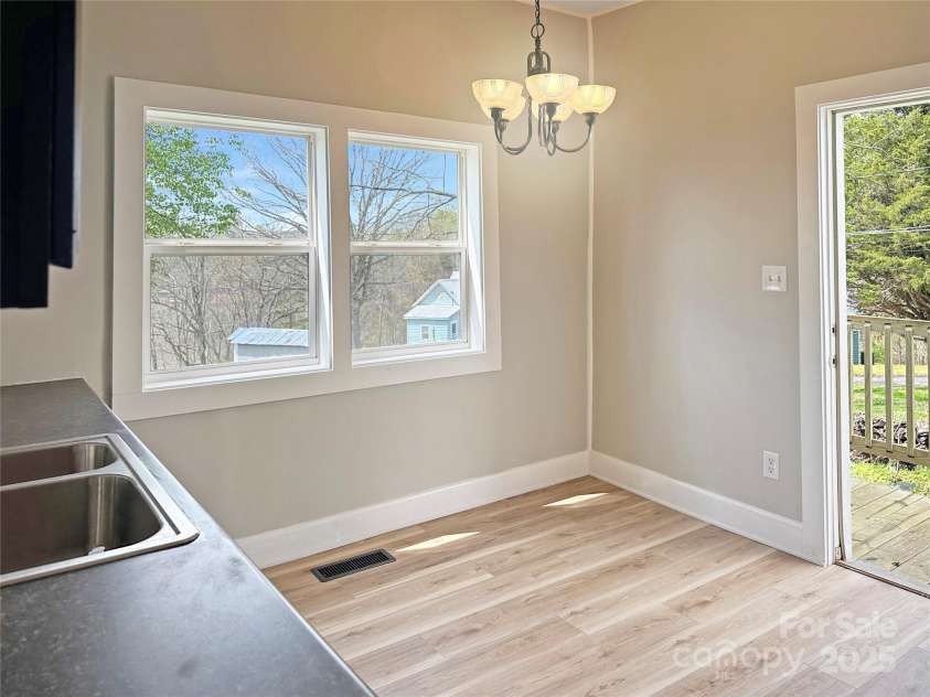 2210 22nd Avenue Court, Hickory, NC 28602.  MLS# CAR4242354, YatesRealty ID 9653. Kitchen with door leading to exterior