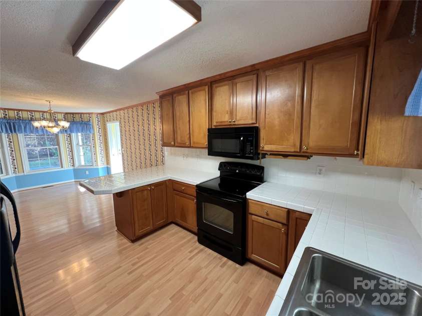 25397 Stony Mountain Road, Albemarle, NC 28001.  MLS# CAR4314846, YatesRealty ID 9653. Kitchen