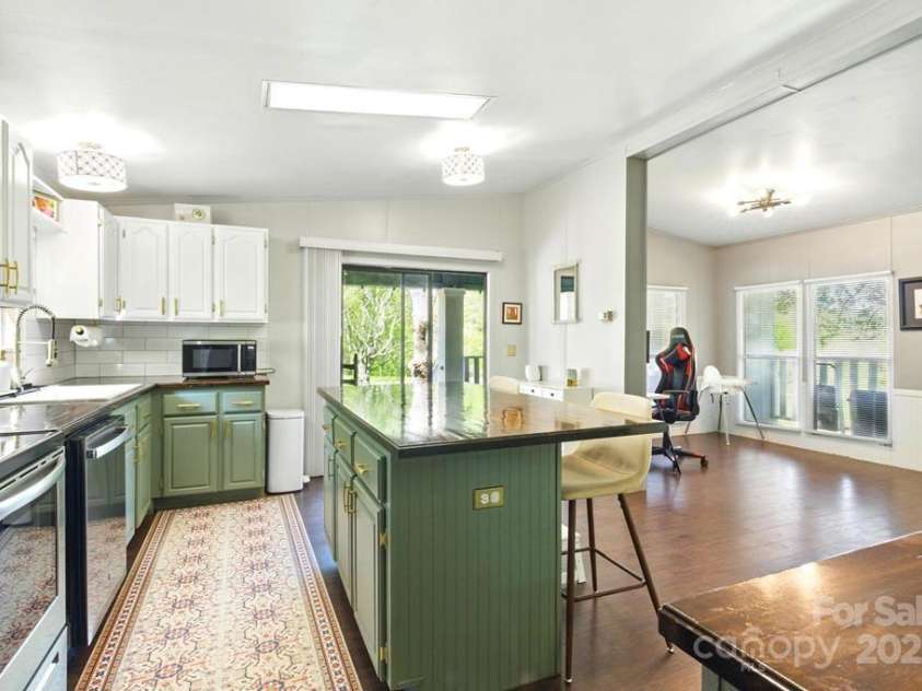 235 Pine Valley Road, Cullowhee, NC 28723.  MLS# CAR4250590, YatesRealty ID 9654. 