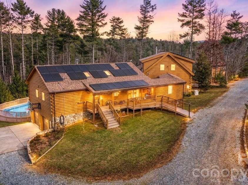 2257 Quiet Creek Lane, Lenoir, NC 28645.  MLS# CAR4435468, YatesRealty ID 9665. AI generated dusk