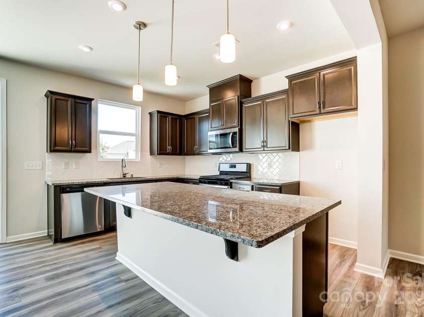 14730 Tamarack Drive, Charlotte, NC 28278.  MLS# CAR4221725, YatesRealty ID 9673. Representational photo only. Actual exterior & interior home colors/finishes will differ.