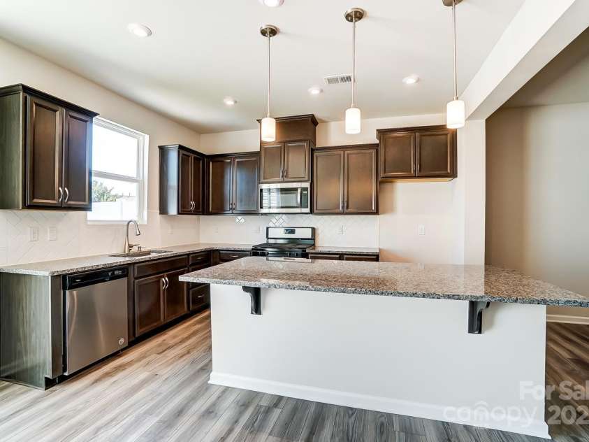 14730 Tamarack Drive, Charlotte, NC 28278.  MLS# CAR4221725, YatesRealty ID 9673. Representational photo only. Actual exterior & interior home colors/finishes will differ.