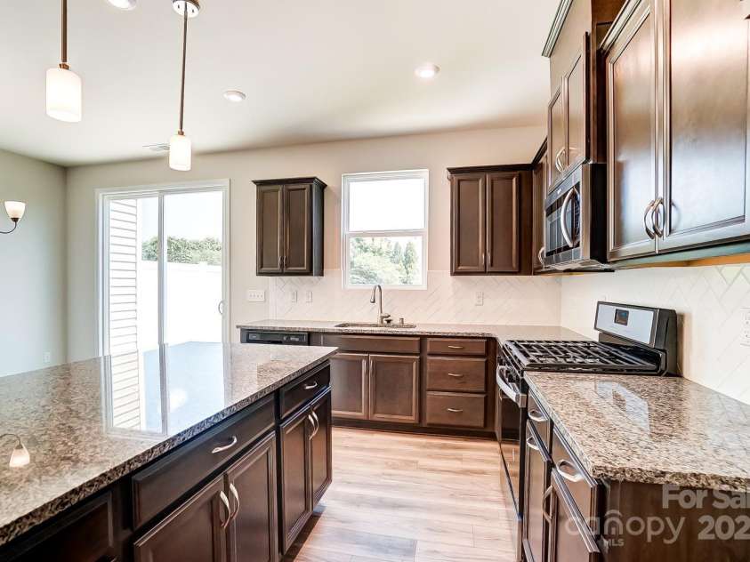 14730 Tamarack Drive, Charlotte, NC 28278.  MLS# CAR4221725, YatesRealty ID 9673. Representational photo only. Actual exterior & interior home colors/finishes will differ.