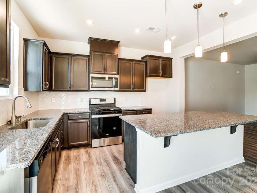 14730 Tamarack Drive, Charlotte, NC 28278.  MLS# CAR4221725, YatesRealty ID 9673. Representational photo only. Actual exterior & interior home colors/finishes will differ.