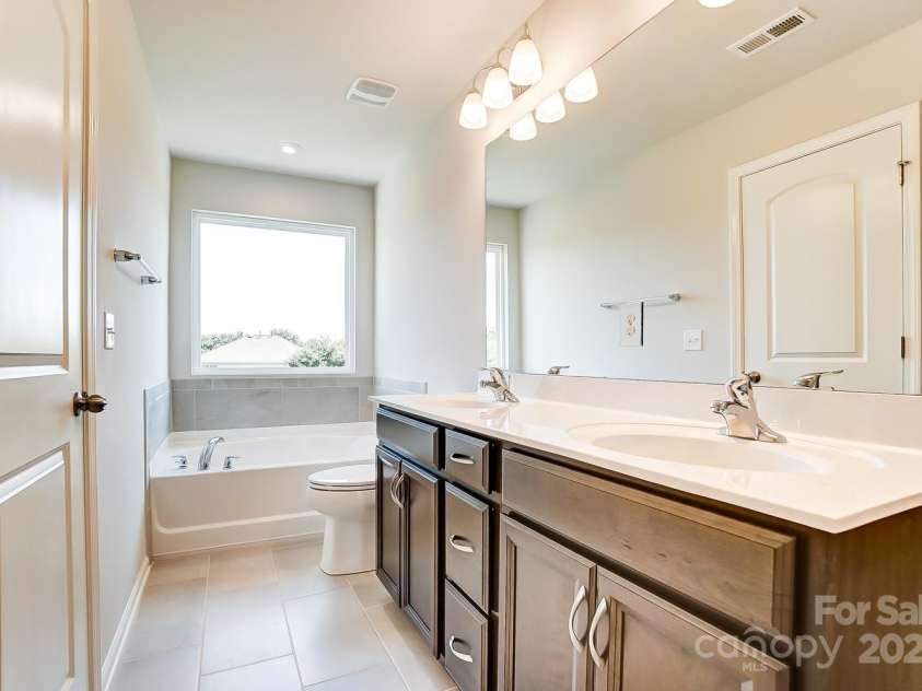 14730 Tamarack Drive, Charlotte, NC 28278.  MLS# CAR4221725, YatesRealty ID 9673. Representational photo only. Actual exterior & interior home colors/finishes will differ.