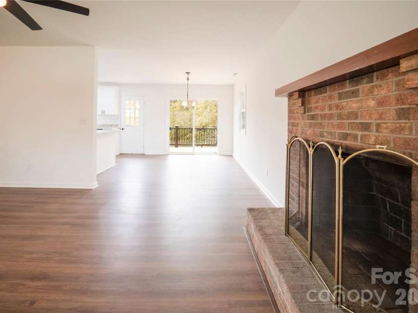 106 Shelly Drive, Hendersonville, NC 28792.  MLS# CAR4366479, YatesRealty ID 9675. Brick fireplace