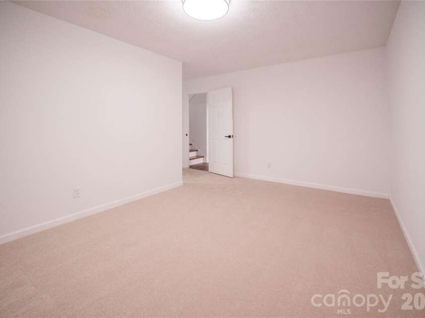 106 Shelly Drive, Hendersonville, NC 28792.  MLS# CAR4366479, YatesRealty ID 9675. Lower flex room/office