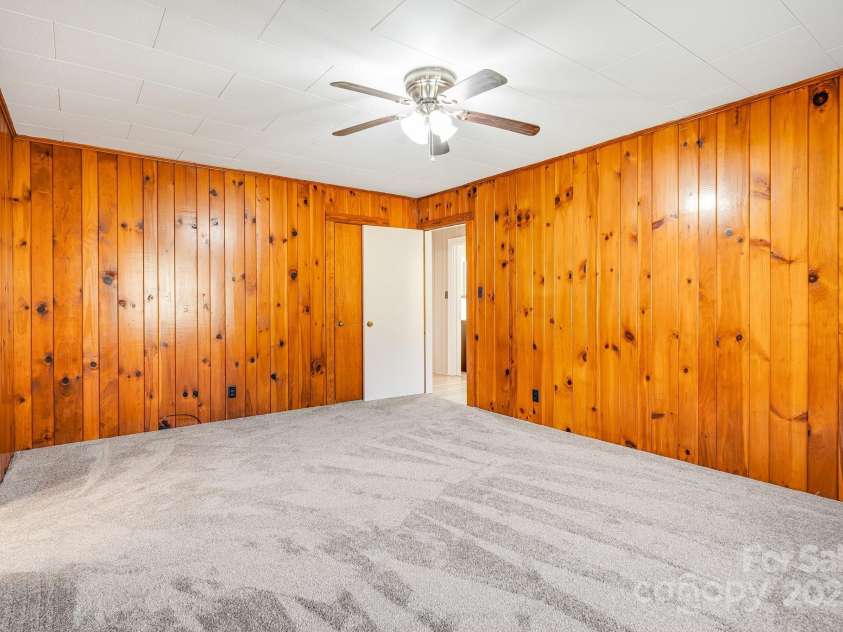 81 Deep Creek Cemetery Road, Bryson City, NC 28713.  MLS# CAR4224937, YatesRealty ID 9679. Knotty Pine Walls