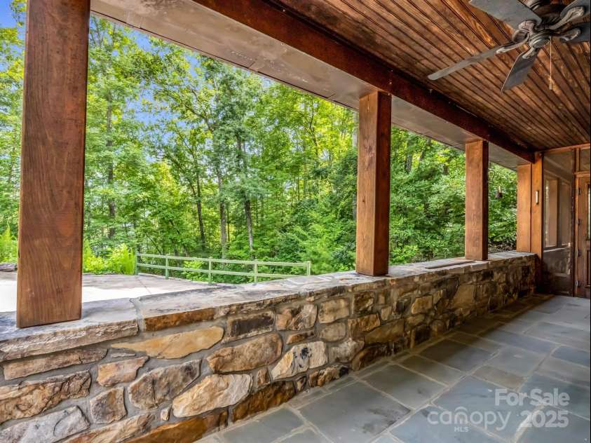 2452 Lake Adger Parkway, Mill Spring, NC 28756.  MLS# CAR4222407, YatesRealty ID 968. Front covered Porch