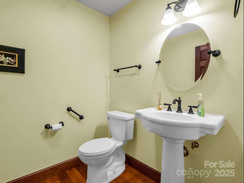 2452 Lake Adger Parkway, Mill Spring, NC 28756.  MLS# CAR4222407, YatesRealty ID 968. Half bath off kitchen