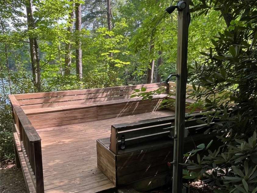 2452 Lake Adger Parkway, Mill Spring, NC 28756.  MLS# CAR4222407, YatesRealty ID 968. Party Deck to lakefront with shower, electric.