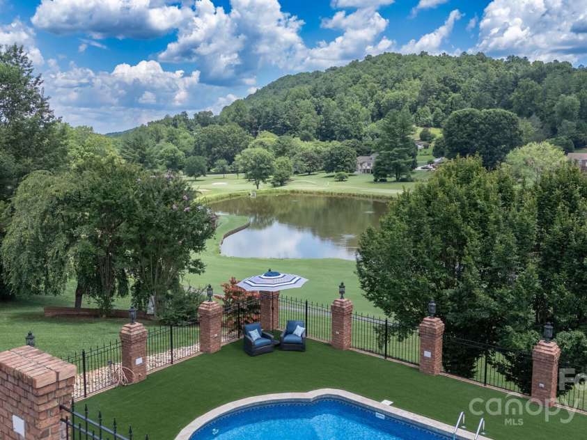 2770 Lakeview Drive, Lenoir, NC 28645.  MLS# CAR4274272, YatesRealty ID 968. Back yard with new pool lining and turf
