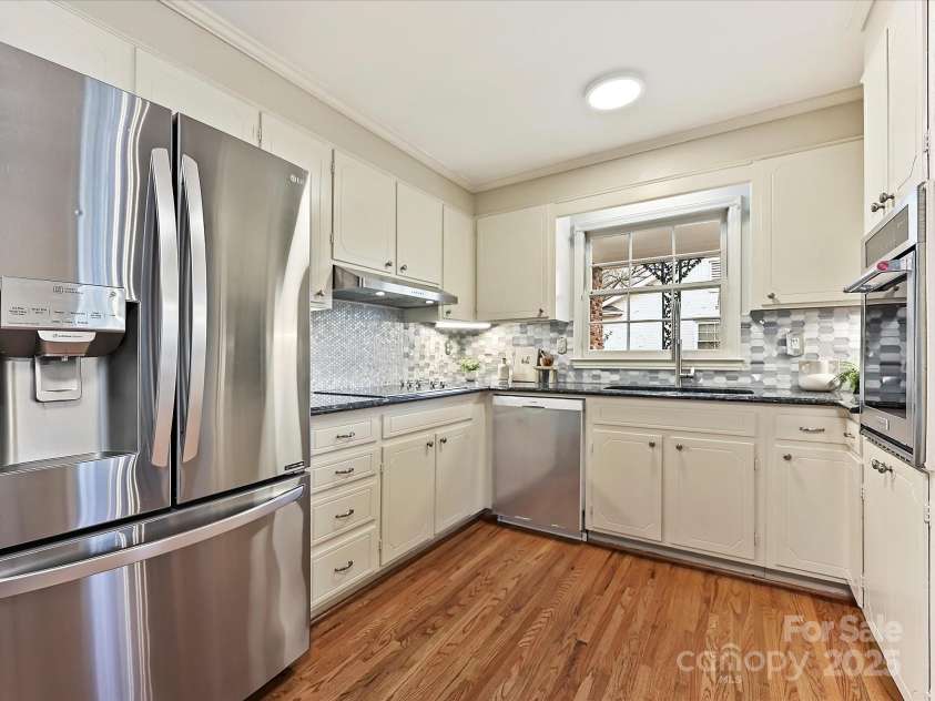 4132 Sulkirk Road, Charlotte, NC 28210.  MLS# CAR4223769, YatesRealty ID 9687. Kitchen With Stainless Steel Appliances