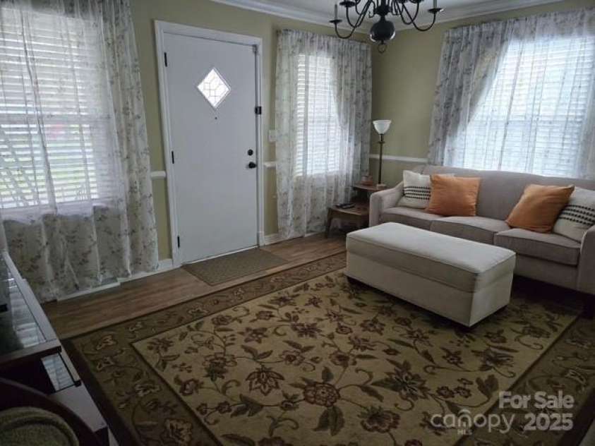 526 Arlington Avenue, Albemarle, NC 28001.  MLS# CAR4243582, YatesRealty ID 9692. Living Room (with front door)