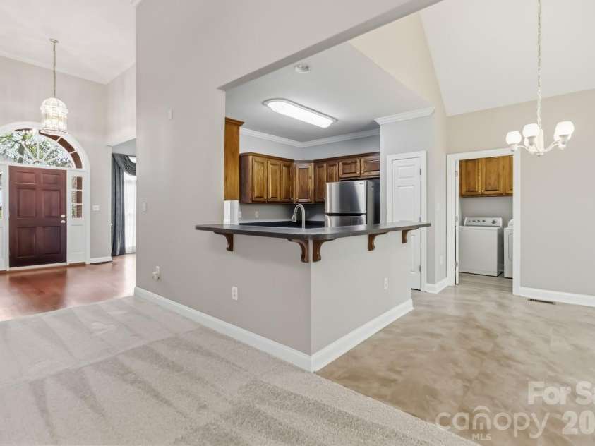 1443 Porch Swing Lane, Matthews, NC 28104.  MLS# CAR4364975, YatesRealty ID 9695. 