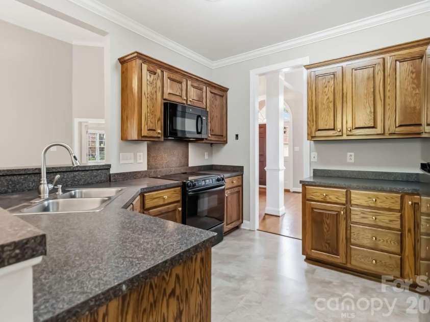 1443 Porch Swing Lane, Matthews, NC 28104.  MLS# CAR4364975, YatesRealty ID 9695. 
