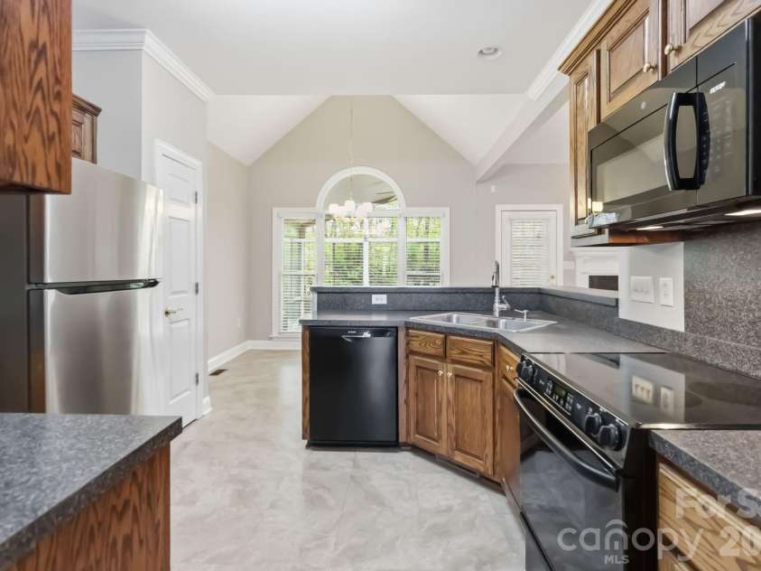 1443 Porch Swing Lane, Matthews, NC 28104.  MLS# CAR4364975, YatesRealty ID 9695. 