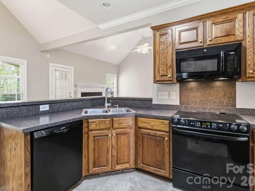1443 Porch Swing Lane, Matthews, NC 28104.  MLS# CAR4364975, YatesRealty ID 9695. 