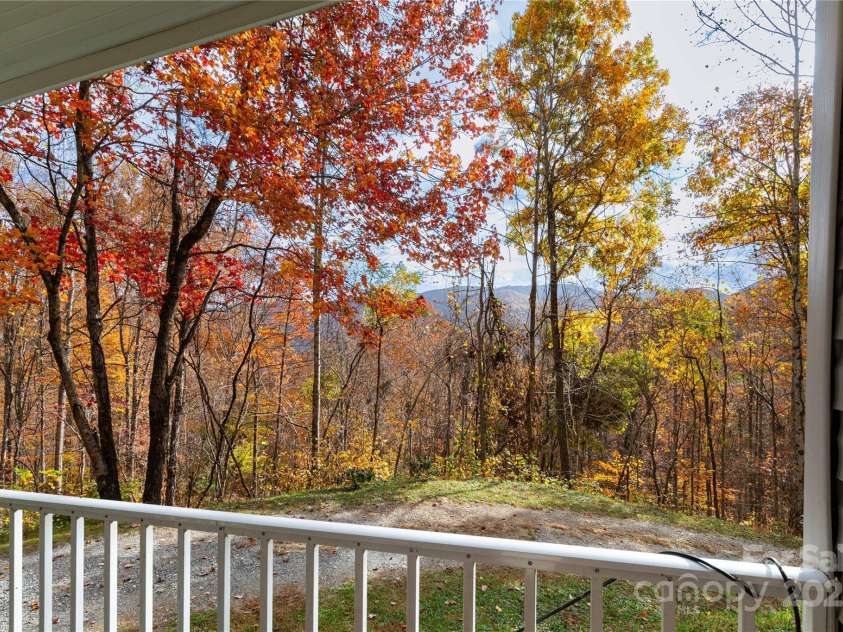418 Milk Sick Cove, Cullowhee, NC 28723.  MLS# CAR4193351, YatesRealty ID 9695. Front View Porch