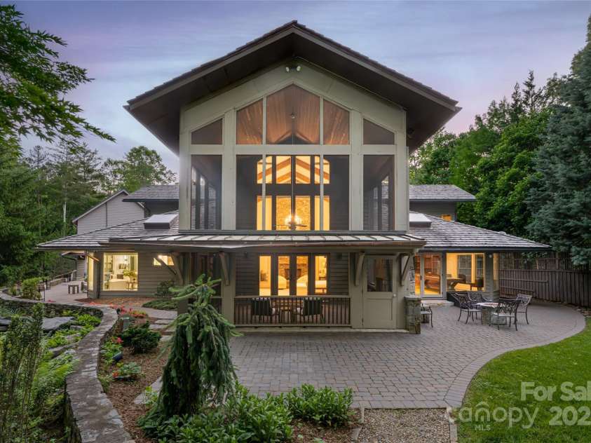 268 Holly Arbor Lane, Asheville, NC 28803.  MLS# CAR4268471, YatesRealty ID 97. Patio space located off the primary suites private screened in patio.