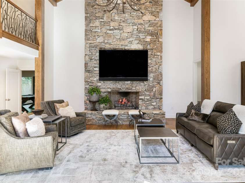 268 Holly Arbor Lane, Asheville, NC 28803.  MLS# CAR4268471, YatesRealty ID 97. This fully automated smart home is powered by SAVANT, allowing effortless control of lighting, climate, entertainment, and security from an app, the TV or a remote located in each room.