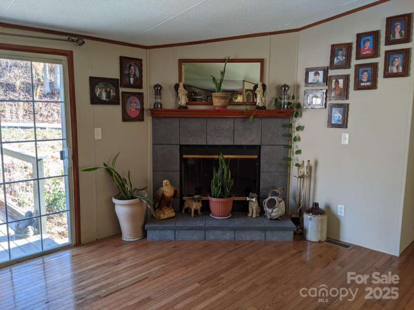 196 Mckinney Road, Weaverville, NC 28787.  MLS# CAR4326472, YatesRealty ID 970. Fireplace