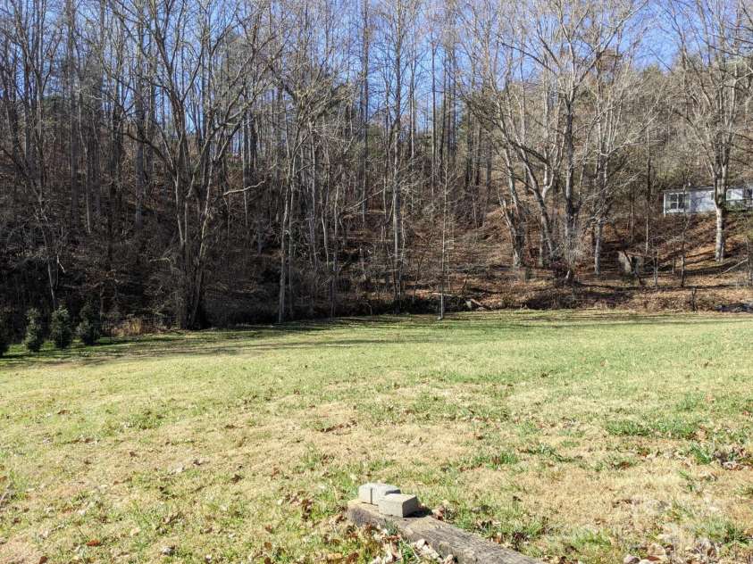196 Mckinney Road, Weaverville, NC 28787.  MLS# CAR4326472, YatesRealty ID 970. Level open front yard