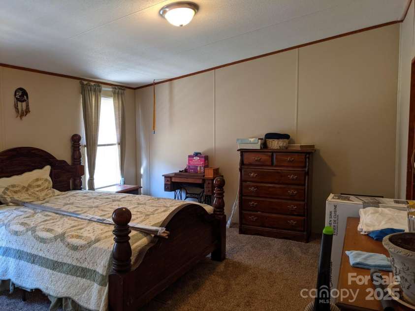 196 Mckinney Road, Weaverville, NC 28787.  MLS# CAR4326472, YatesRealty ID 970. Primary bedroom