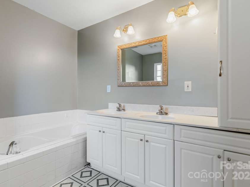 60 Hilltop View Drive, Fletcher, NC 28732.  MLS# CAR4202444, YatesRealty ID 9701. Big primary bath