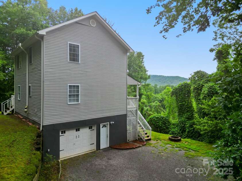 60 Hilltop View Drive, Fletcher, NC 28732.  MLS# CAR4202444, YatesRealty ID 9701. Drive in basement, ample parking