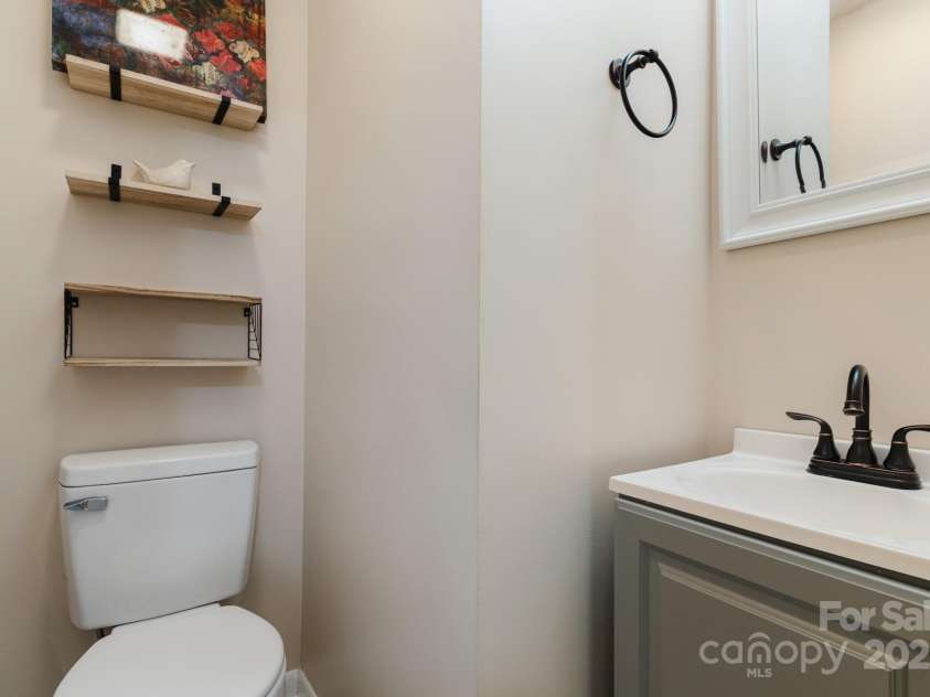 60 Hilltop View Drive, Fletcher, NC 28732.  MLS# CAR4202444, YatesRealty ID 9701. Half bath on main