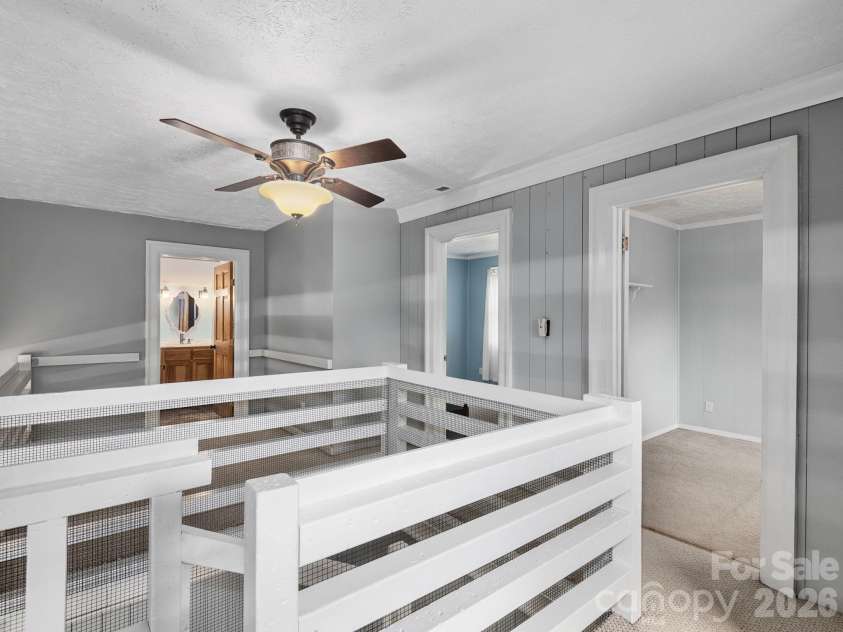 6 Star Berry Lane, Fairview, NC 28730.  MLS# CAR4315024, YatesRealty ID 9705. Lofted Upper Level Complete With Two Additional Guest Bedrooms And Full Bath