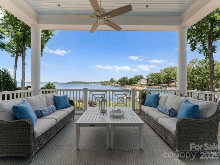 16921 Jetton Road, Cornelius, NC 28031.  MLS# CAR4191237, YatesRealty ID 971. Covered porch off of living room