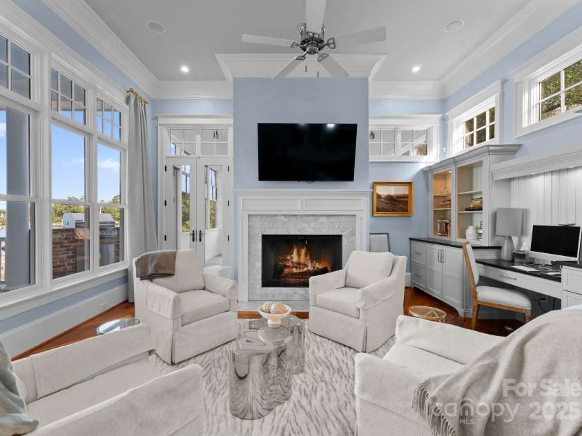 16921 Jetton Road, Cornelius, NC 28031.  MLS# CAR4191237, YatesRealty ID 971. Family room with access to screened porch