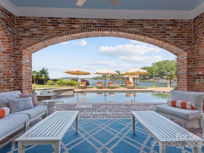 16921 Jetton Road, Cornelius, NC 28031.  MLS# CAR4191237, YatesRealty ID 971. Lower level covered porch